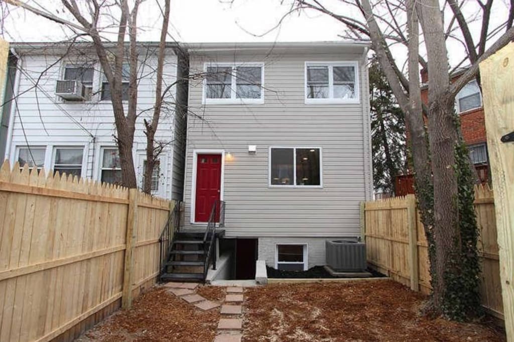 Entry into basement apartment from the back of the rowhouse.