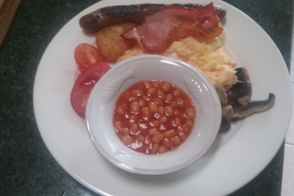 English breakfast with scrambled eggs