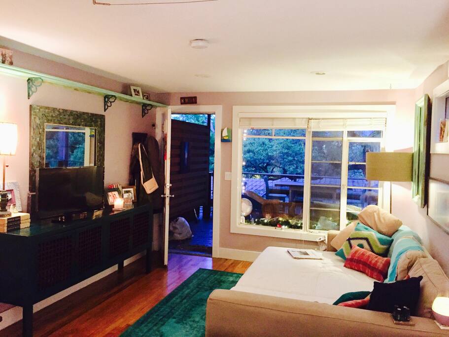 Comfortable and homey studio space even with couch bed pulled out. Google Echo and Smart TV.