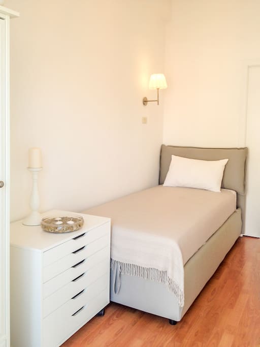 Lovely single zone memory foam mattress bed, with closet, storage, and private door to balcony.