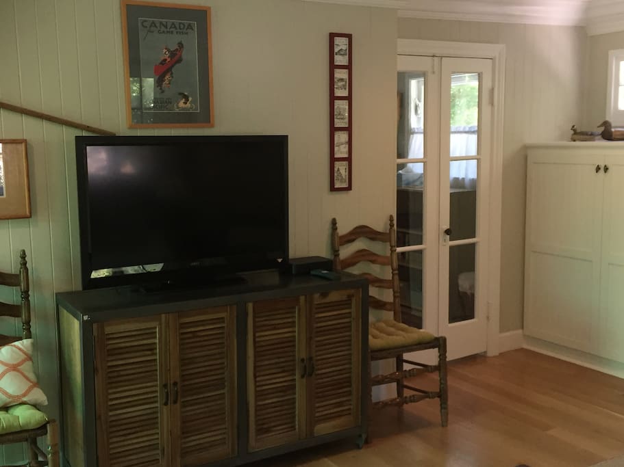 Living room has small adjacent study/office