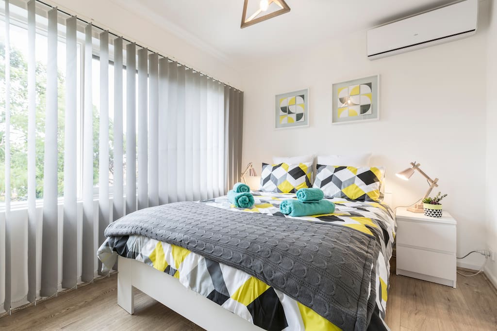 Modern and comfortable bedroom with an ensuite and an air conditioner to keep you warm in winter and cool in summer