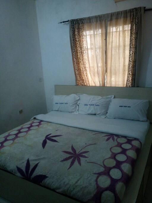 Pure White Cotton Bedsheets with Bedsheet underneath the Big Duvet