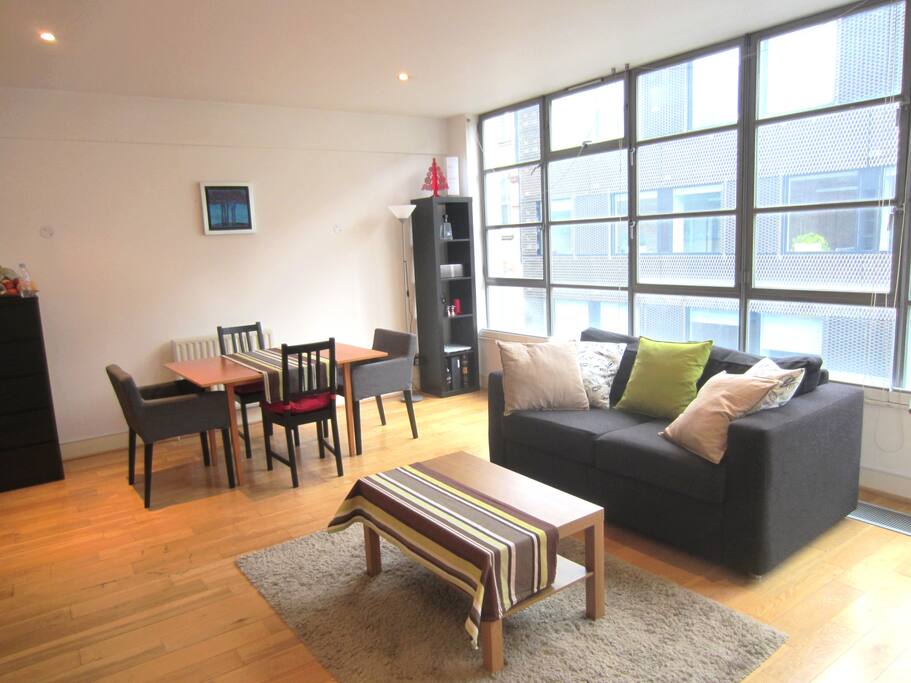 Spacious Reception Room with a dining table