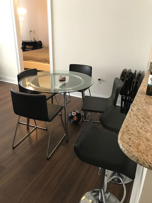 Our dining table is brand new and fits from 4-6