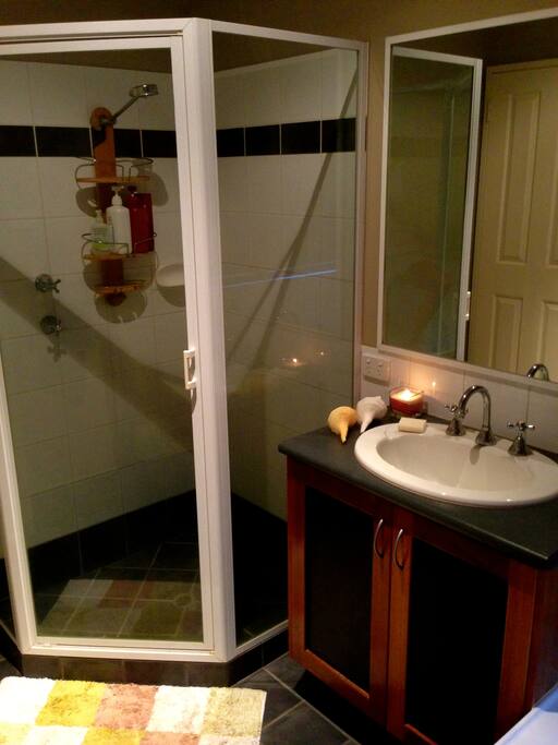 Private bathroom with shower, bath and seperate toilet.