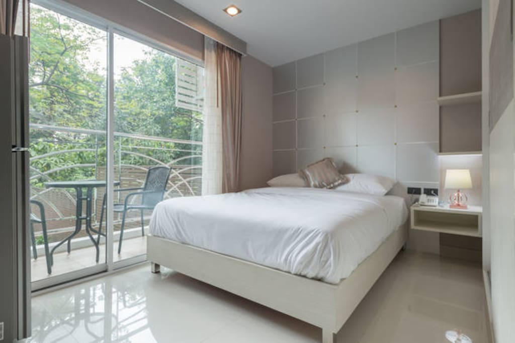 Bedroom with small balcony