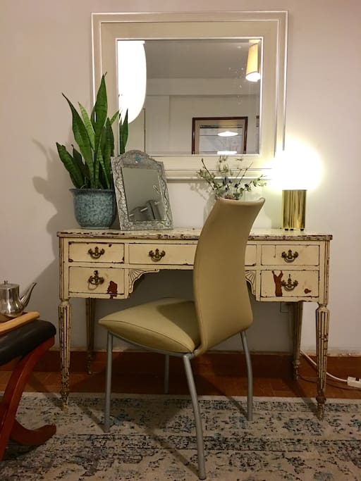 Desk area in bedroom. Need an iPhone charger (or adapter if you're traveling from abroad?) We've got you covered.