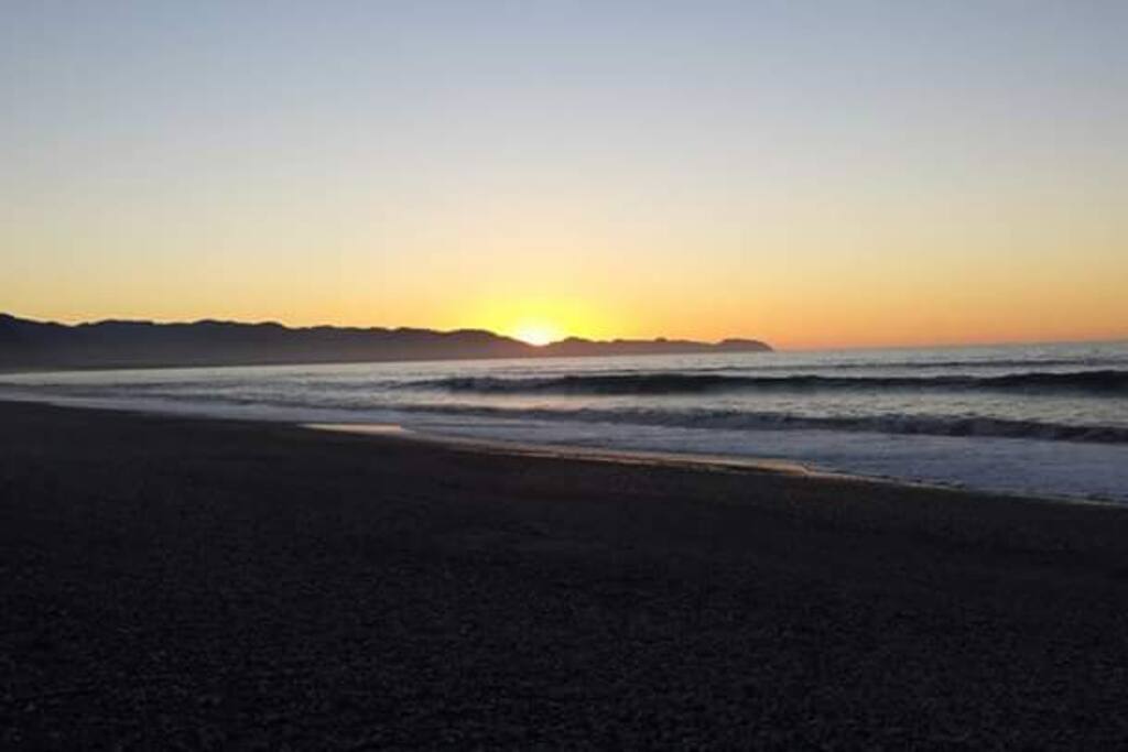A five minute walk to our stunning beach.. Looking towards Jacksons Bay