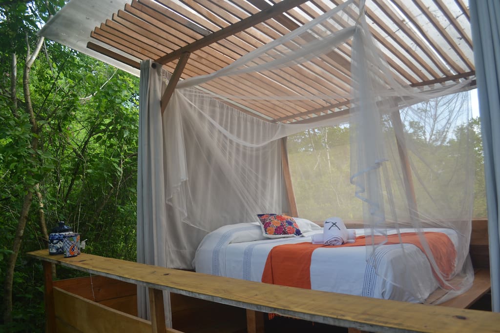 Comfortable Queensize bed, private shower, eco-toilet and hand sink inside the tent. Surrounded by nature in comfort.