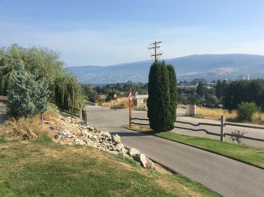 The very first home on the beautiful Westbench of Penticton with access to a paved and lit walkway to Riverside market, Starbucks, Cobbs breads, Quality Greens, cold beer and wine and so much more!