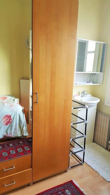 There is a huge cupboard with three doors so a LOT of storage space!