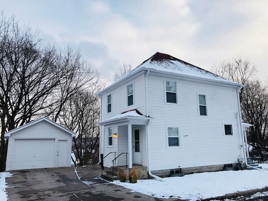 Entryway and garage of house. The modern spacious house is located in downtown Saint Paul and there are stairs conveniently located two blocks away to many great restaurants, shops, bars and Xcel Energy Center!