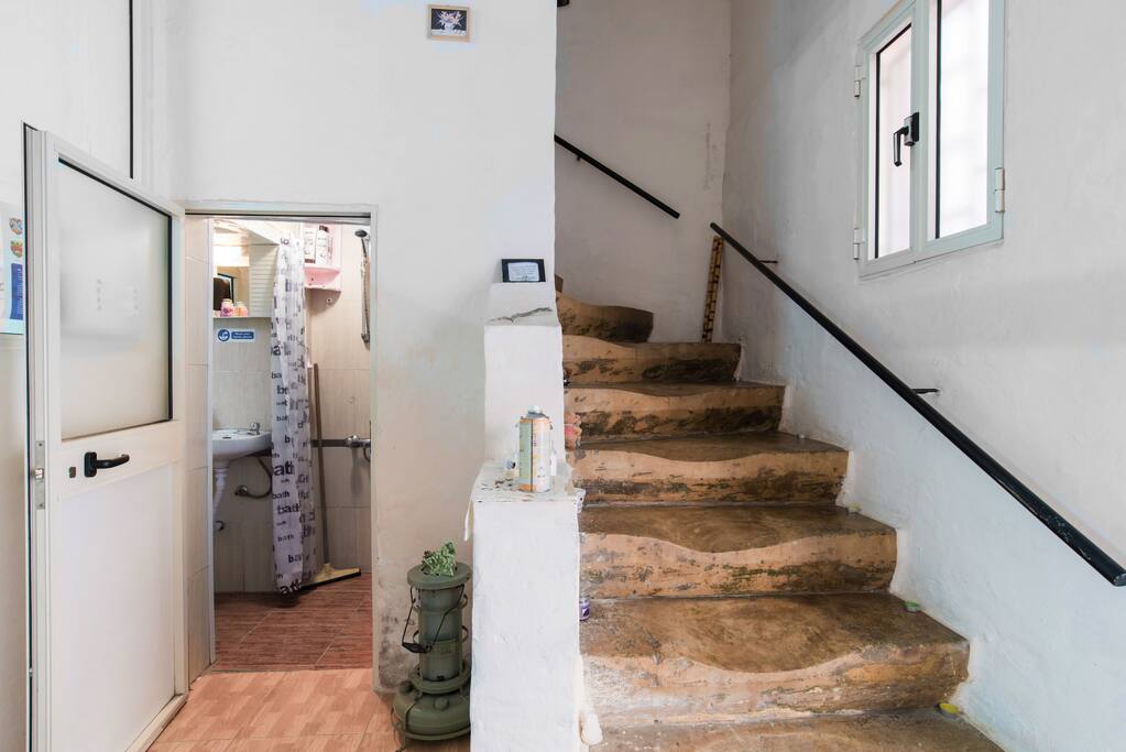 These well worn stairs lead the way to the bedroom, terrace and meditation room. They must have seen and heard a lot in 300 years!
