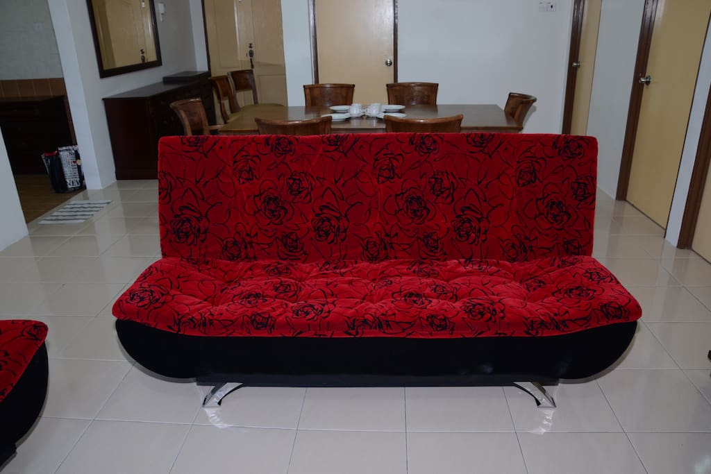 sofa bed and dining table