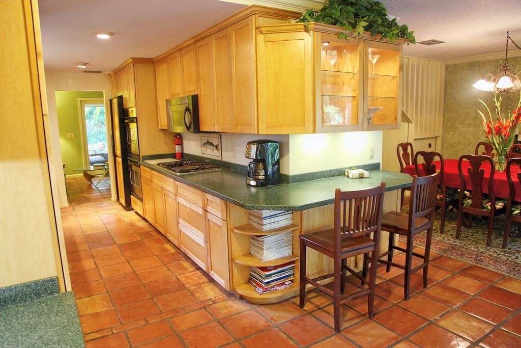 Kitchen has gas cooktop, dual convection oven, breakfast nook