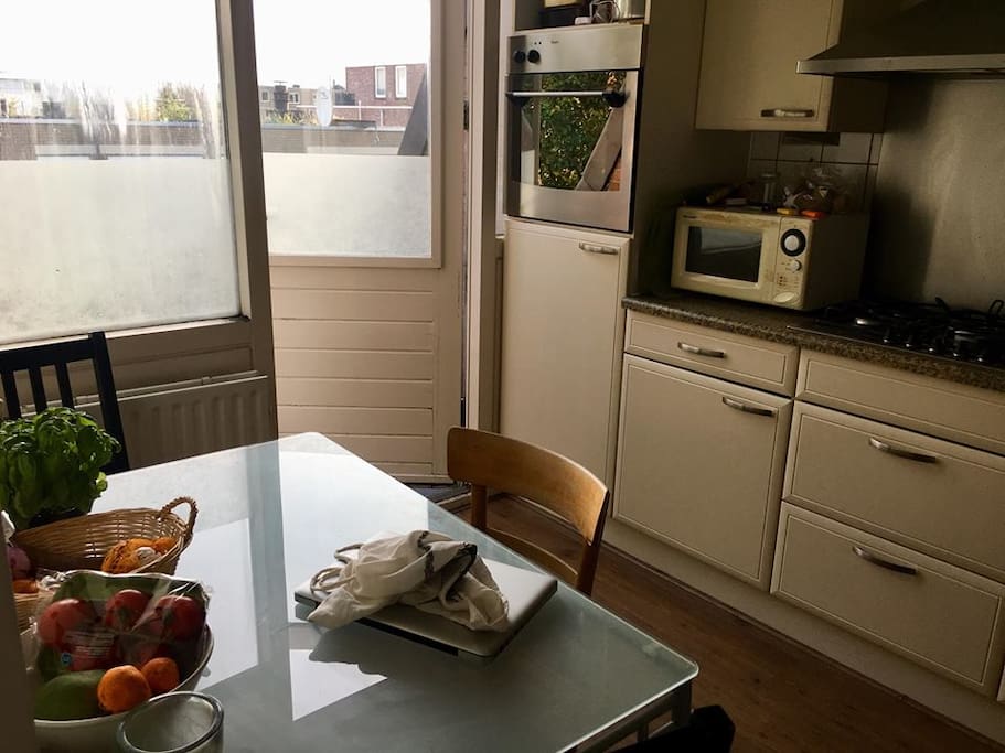 Kitchen with oven, stove, microwave, kettle, private refrigerator for guests, fully equipped