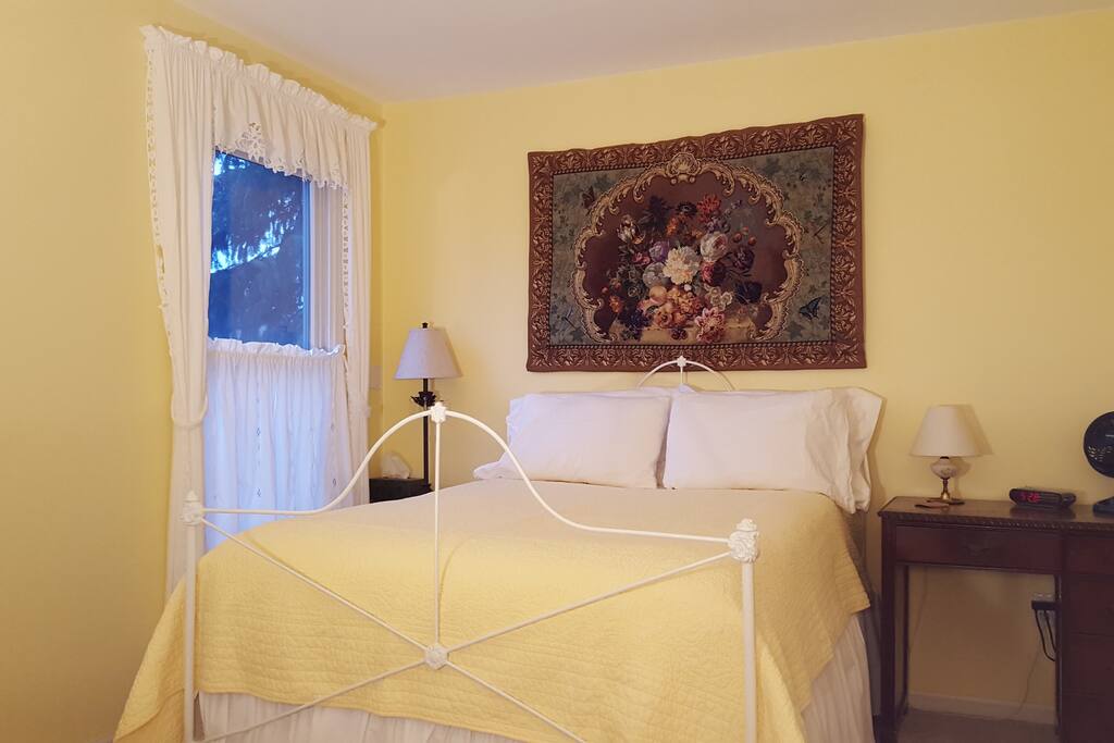 Full size bed with plush mattress; room is 130 sq ft.