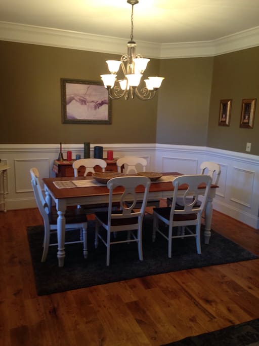 Open Dining room that easily sits 8 people.