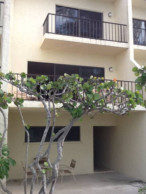 Patio on ground level near the pool.