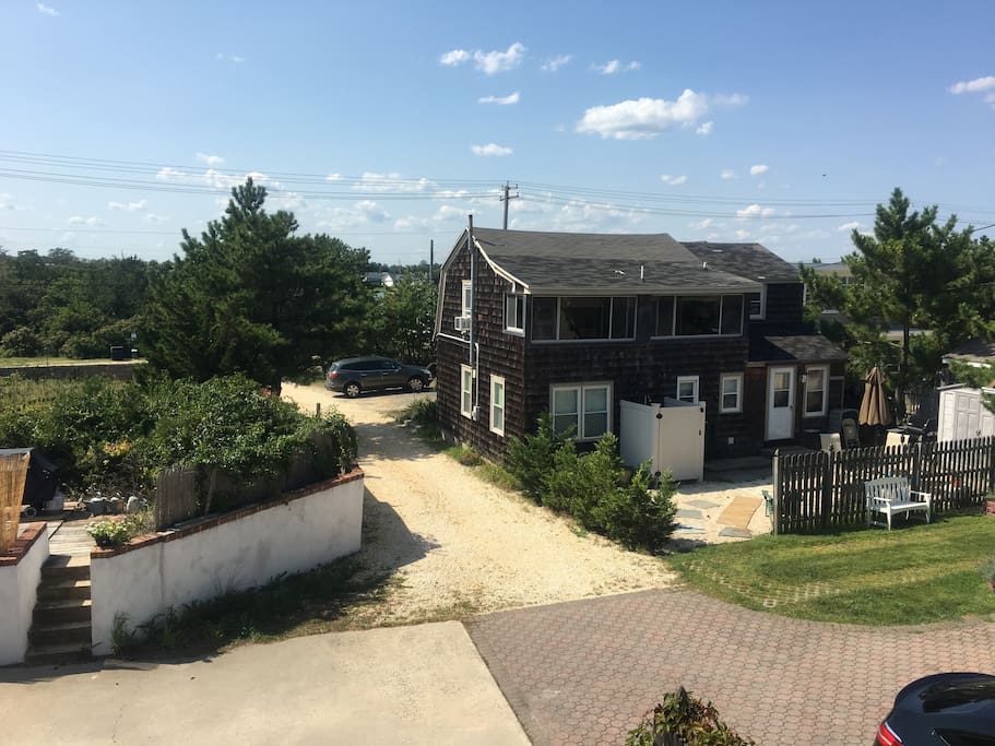 view of the rear of the cottage - loft apartment on 2nd level.