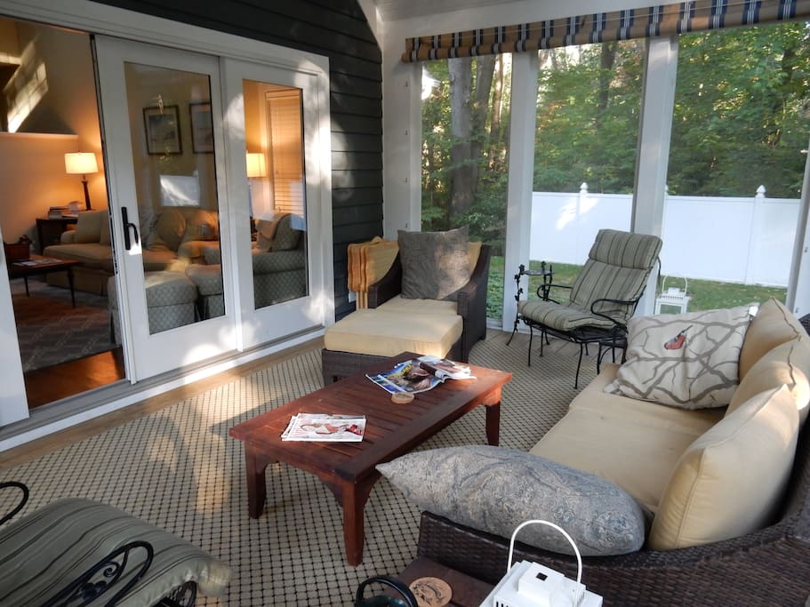 Cozy screened porch, adjoining the great room.