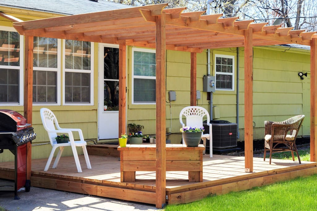 Newley built pergola/deck with plenty of seating for friends & family get togethers. Patio has a grill attached for guest use and leisure seating area and firepit.
