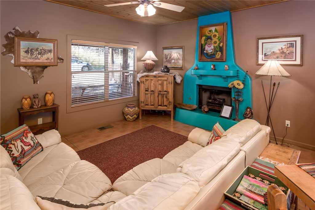 Sink into the cool leather sofa as you and your guests settle in for the evening at Adobe Hacienda!