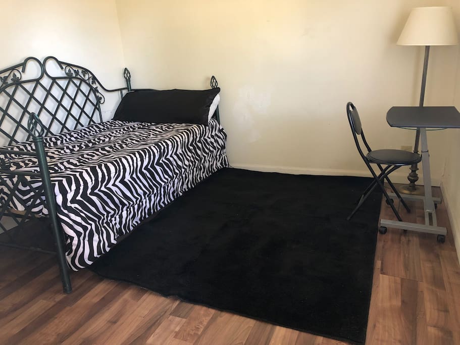 Day bed, convertible to Queen or another twin.