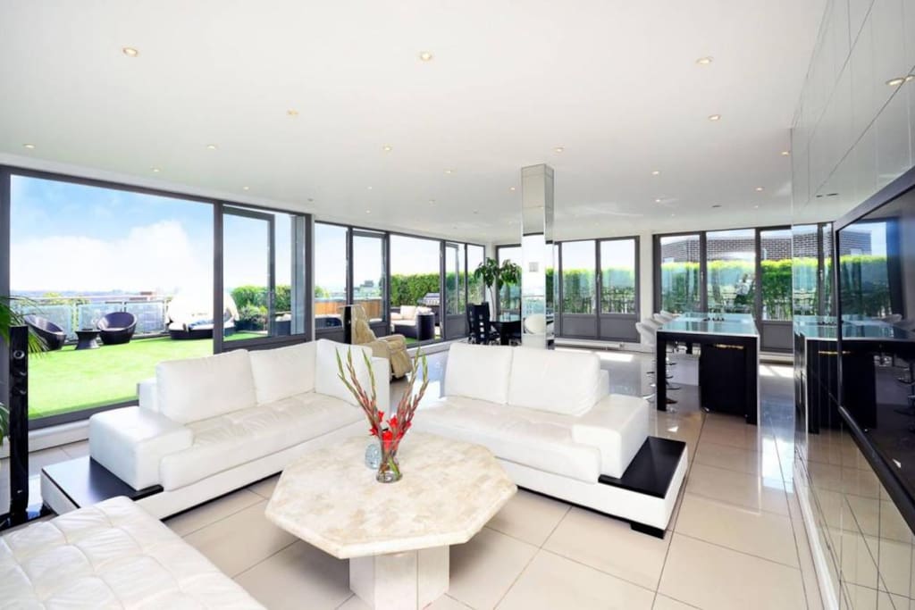 Open Plan Kitchen/Reception with access to Terrace.