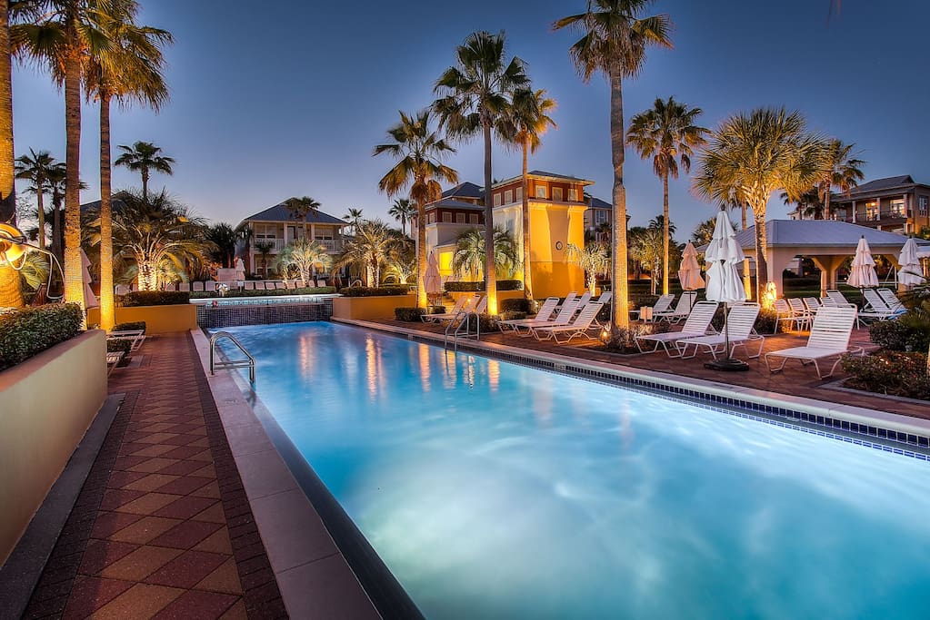 Lagoon pool surrounded by tropical palms