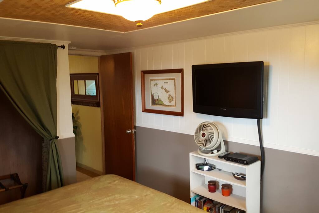 Flat screen TV, with hundreds of cable stations.