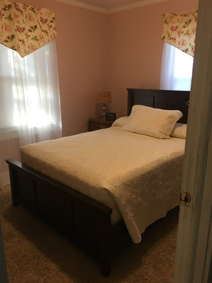 This is the left side bedroom. Pictured has a full-size bed.
