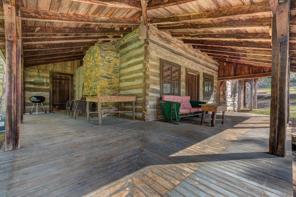 The large wraparound porch is perfect for relaxing, telling stories, and soaking up the beautiful scenery that our property offers.