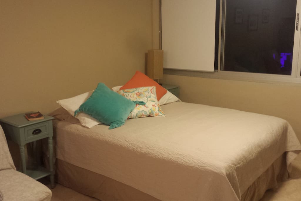 Queen bed at night
