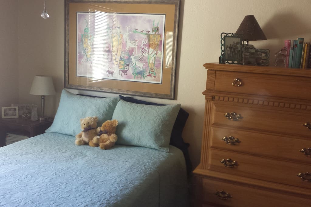 Spacious, comfy guest room with queen bed, highboy dresser and large closet