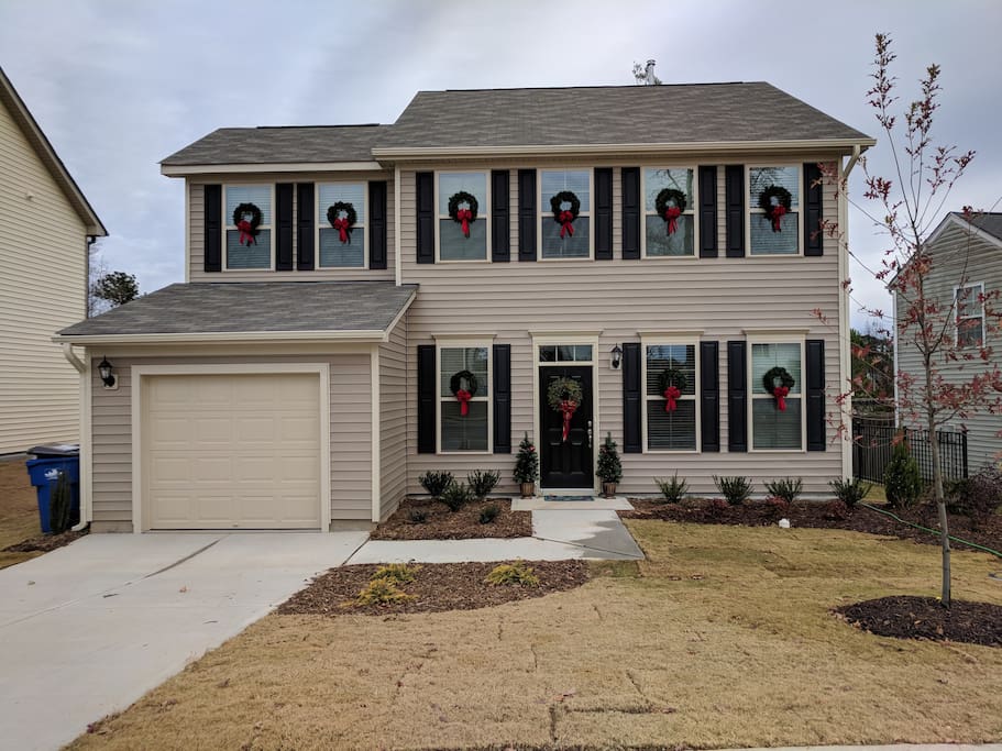 The front of our house during the holidays! There is plenty of street parking in our neighborhood and typically a space in front of the house for our guests to park.