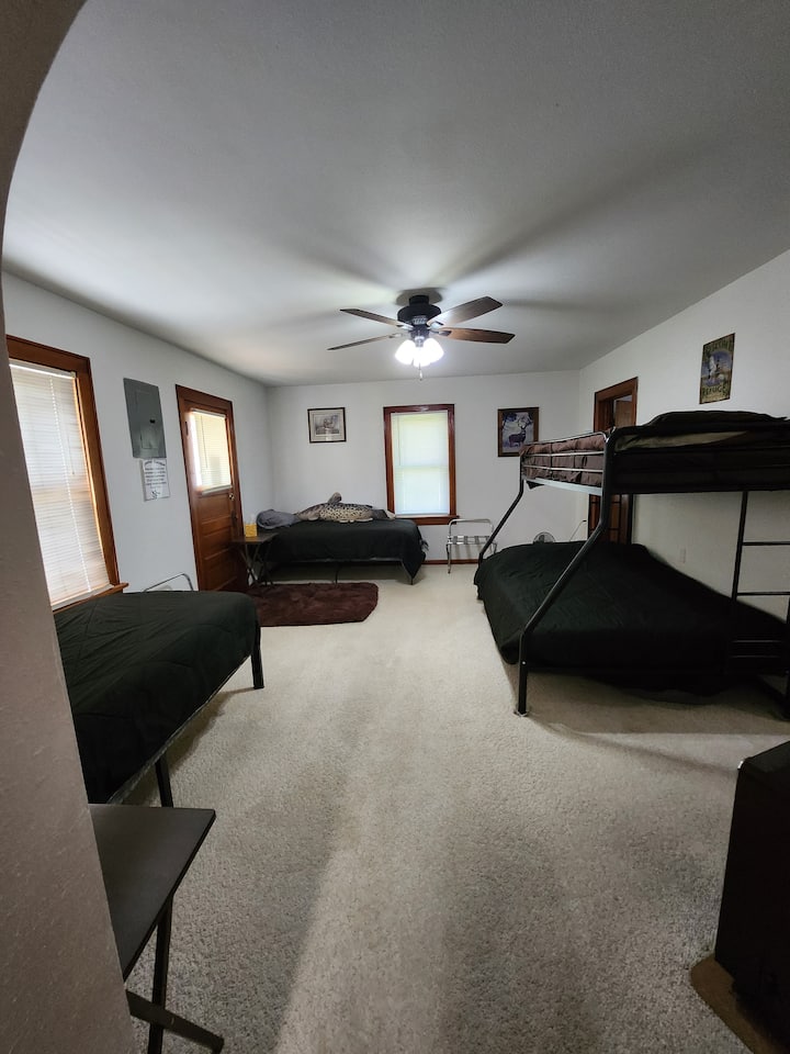 A second living room has 4 additional beds