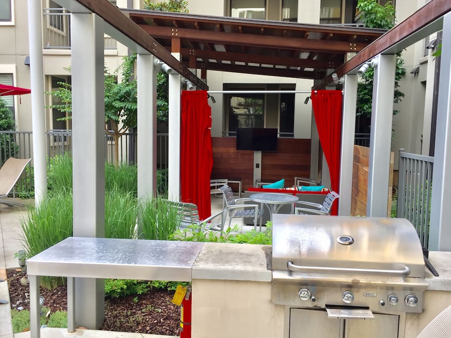 Cabana, TV, and grilling area by the pool!!