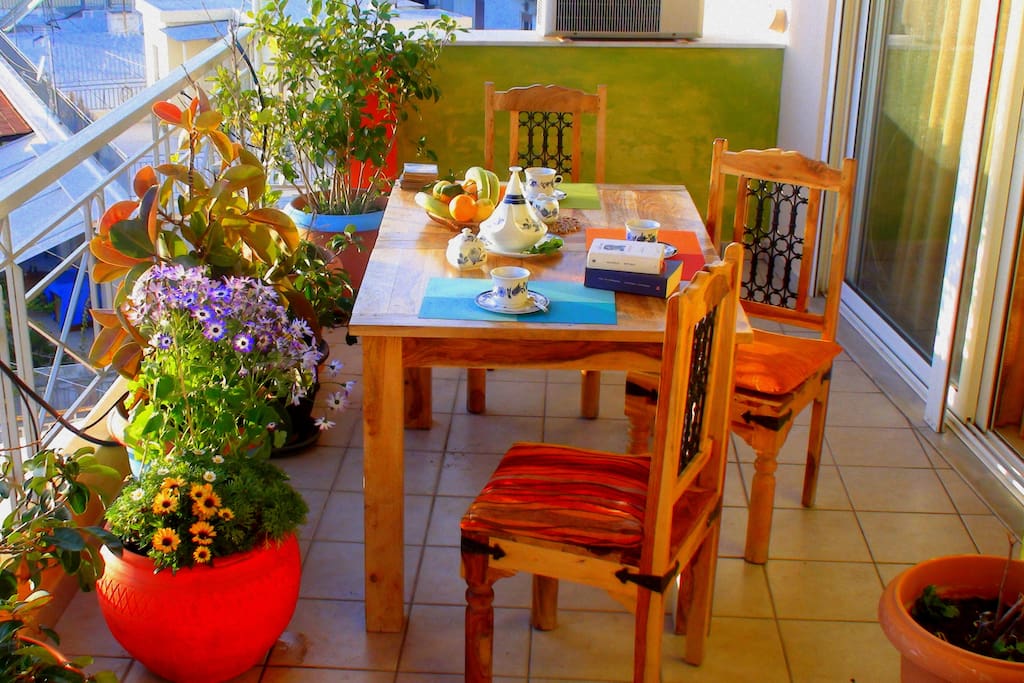 breakfast on a sunny balkony