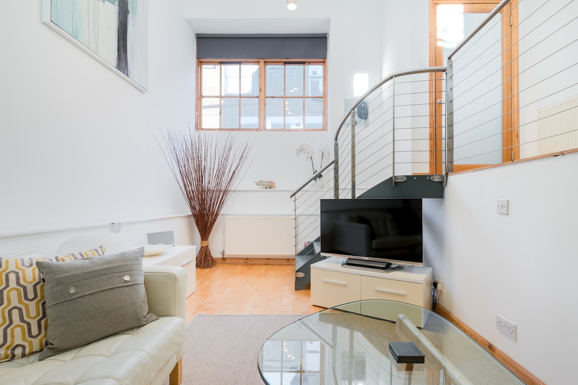 Unwind in the Mezzanine Dining Space at a West End Abode
