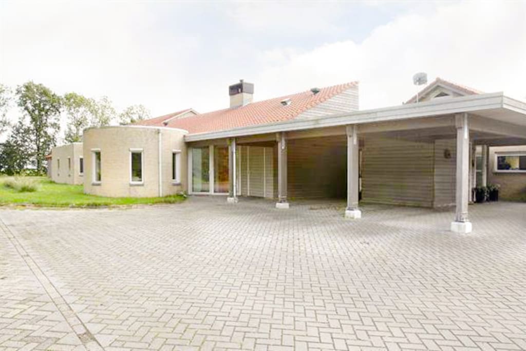 Front view with carport