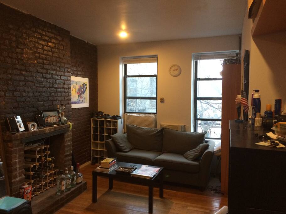 Family room. Exposed brick wall!
Natural light.