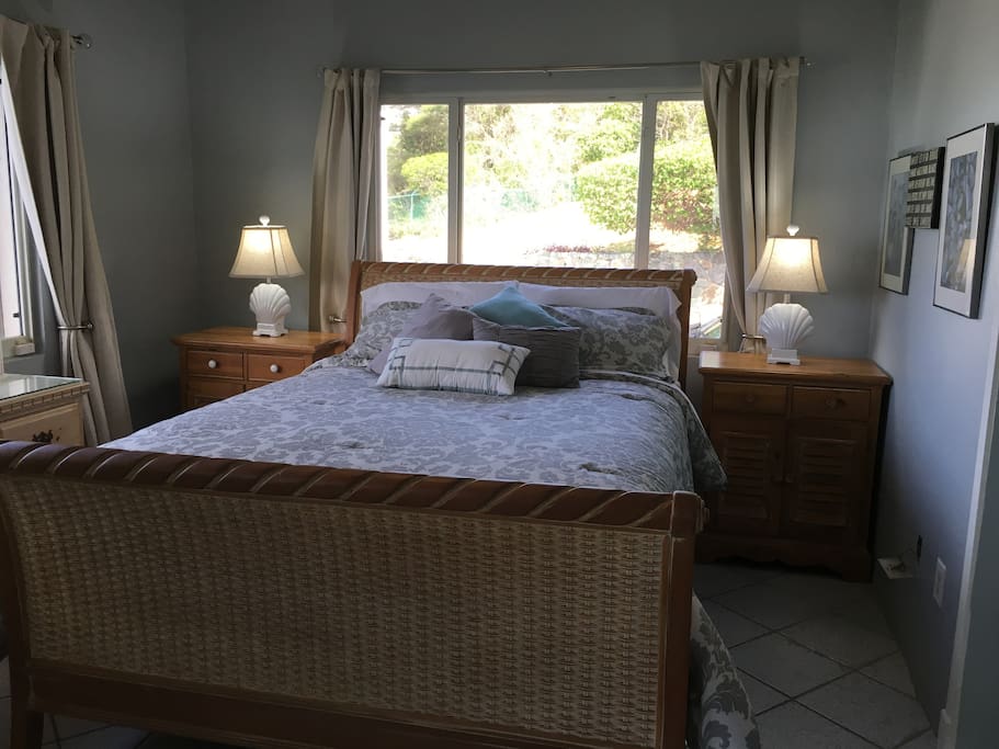Queen sized bed in the West Wing Room