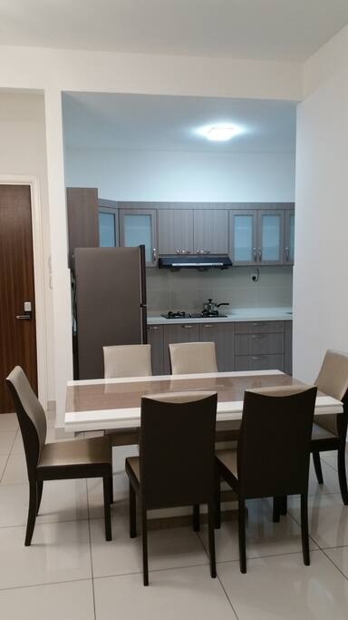 Dining table and chairs provided.
