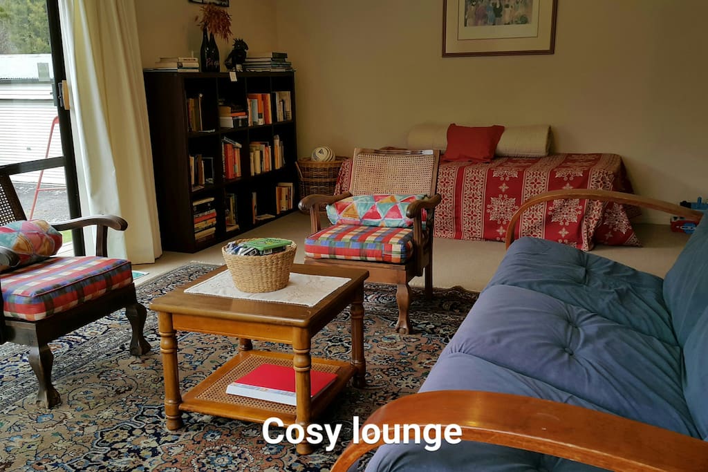 Cosy lounge with books, games, toys, freeview tv, dvd's