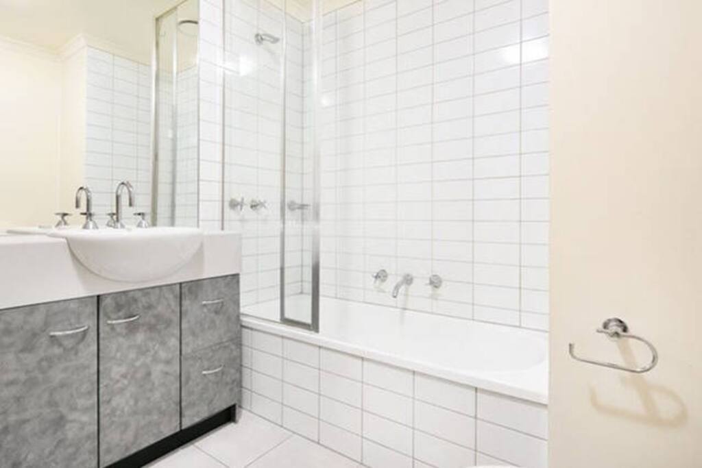 Bathroom with shower over bath tub