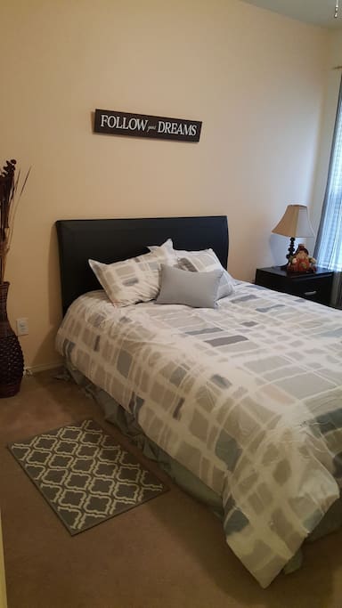 This is our guest bedroom with a comfortable queen bed.