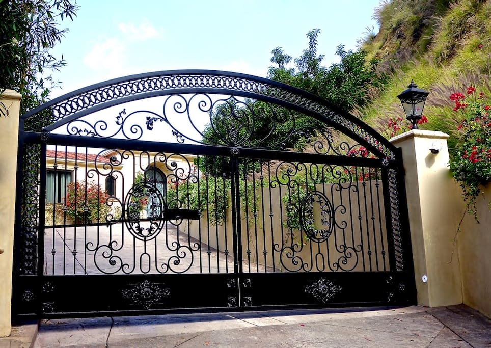 GATED ENTRANCE TO THE PRIVATE DRIVEWAY
+