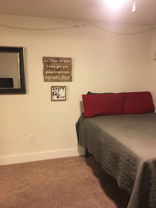 Full bed in bedroom with lock